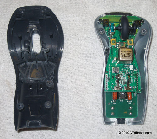 The mouse case will come apart. Discard the dark plastic piece on the left of this photo.